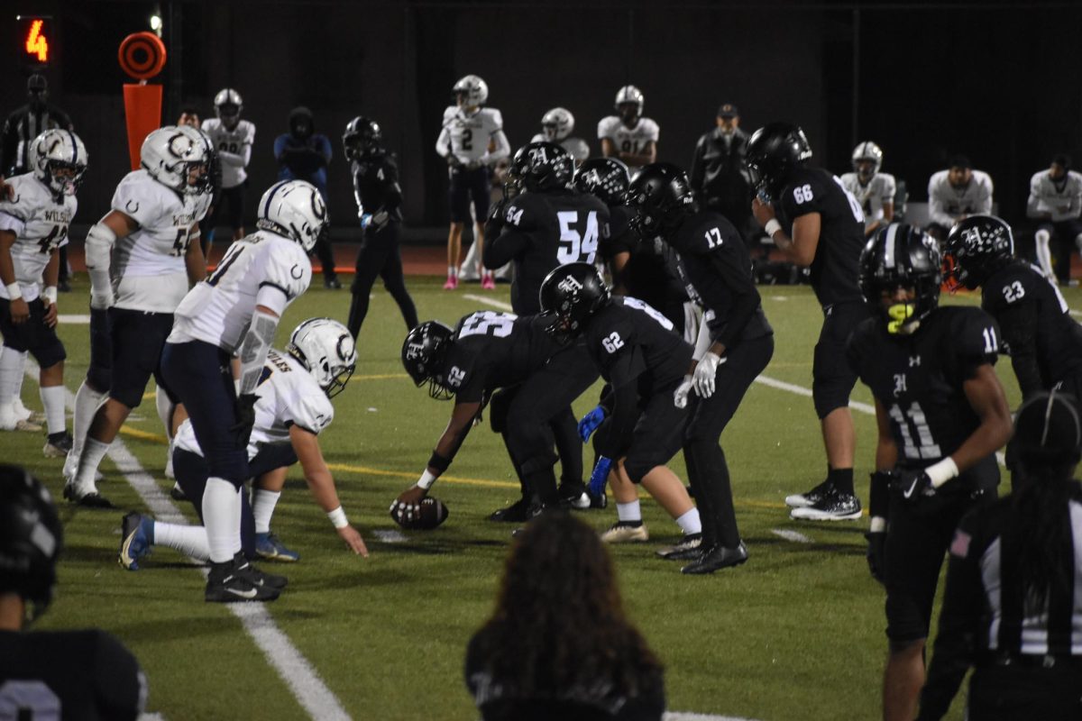 Hawkins offensive line working to increase their already 18 to 13 lead in Fridays semifinal CIF game against Wilson HS