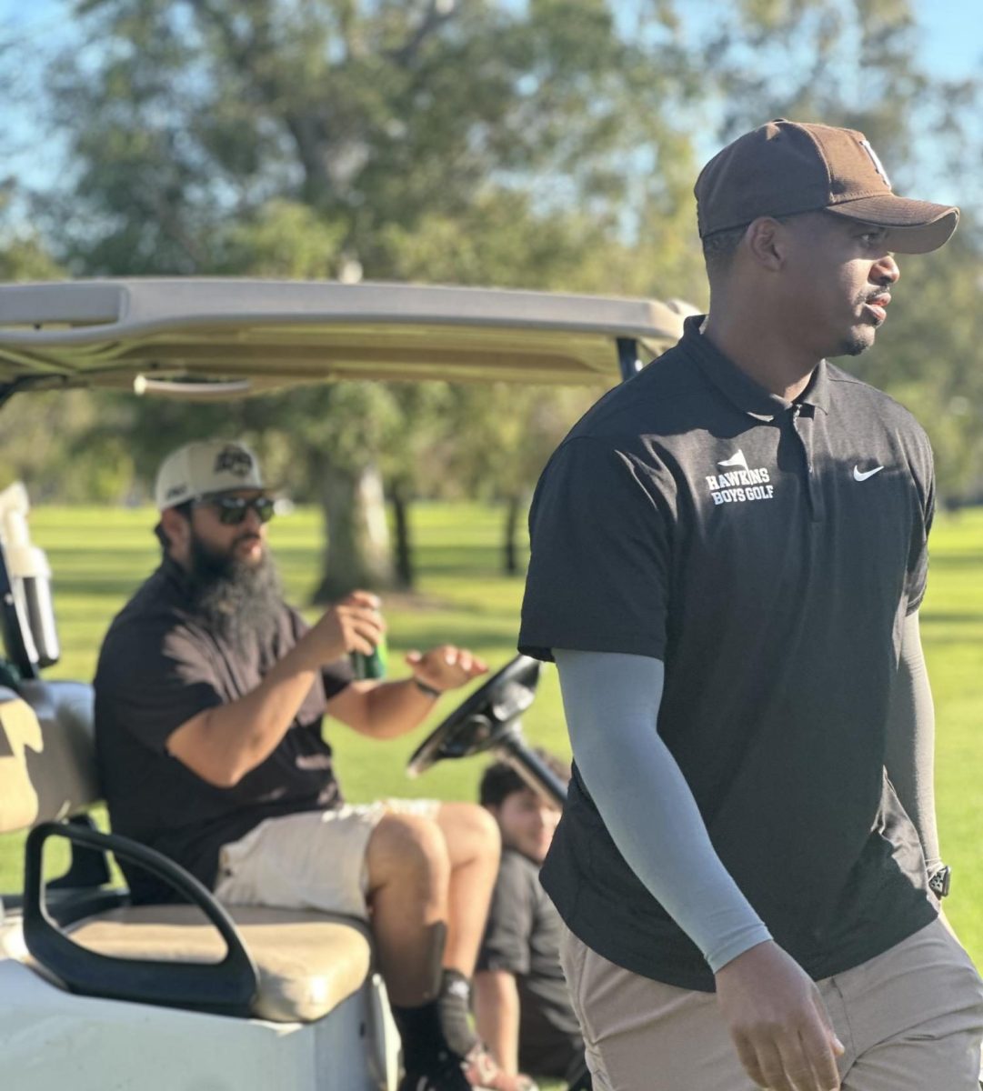 Both coaches of the Boy's Golf Team: Coach Brown and Coach Jorge. Look at that amazing aura from Coach Brown